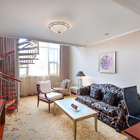 Holiday Inn Zhengzhou Zhongzhou By Ihg Екстер'єр фото
