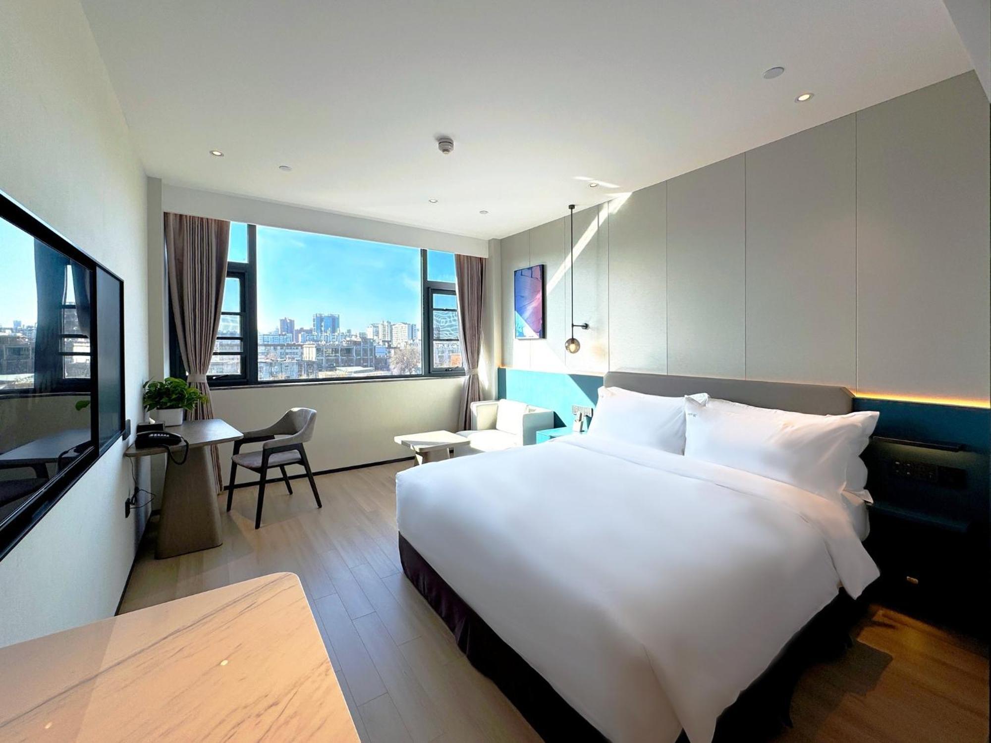Holiday Inn Zhengzhou Zhongzhou By Ihg Екстер'єр фото