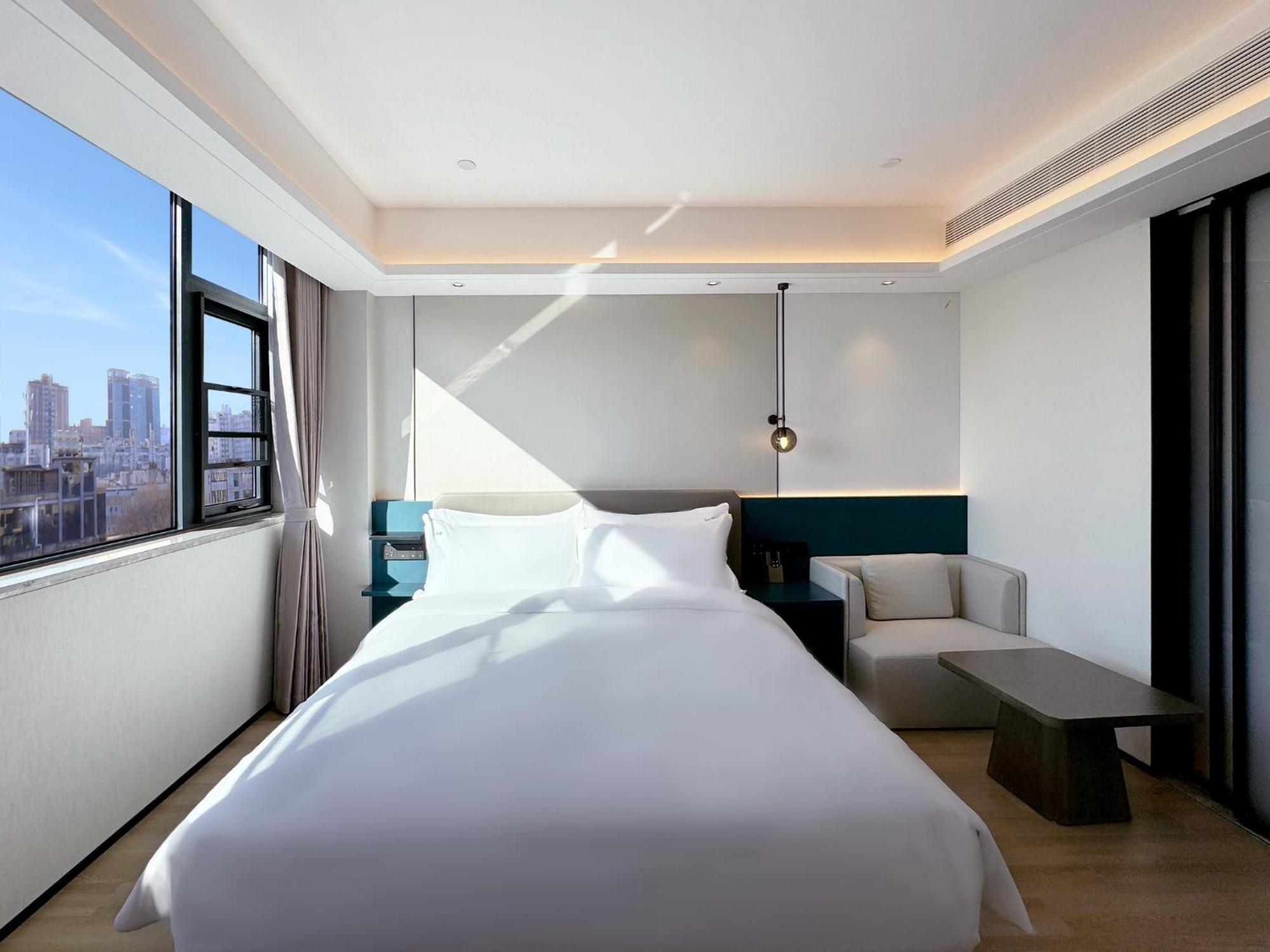 Holiday Inn Zhengzhou Zhongzhou By Ihg Екстер'єр фото